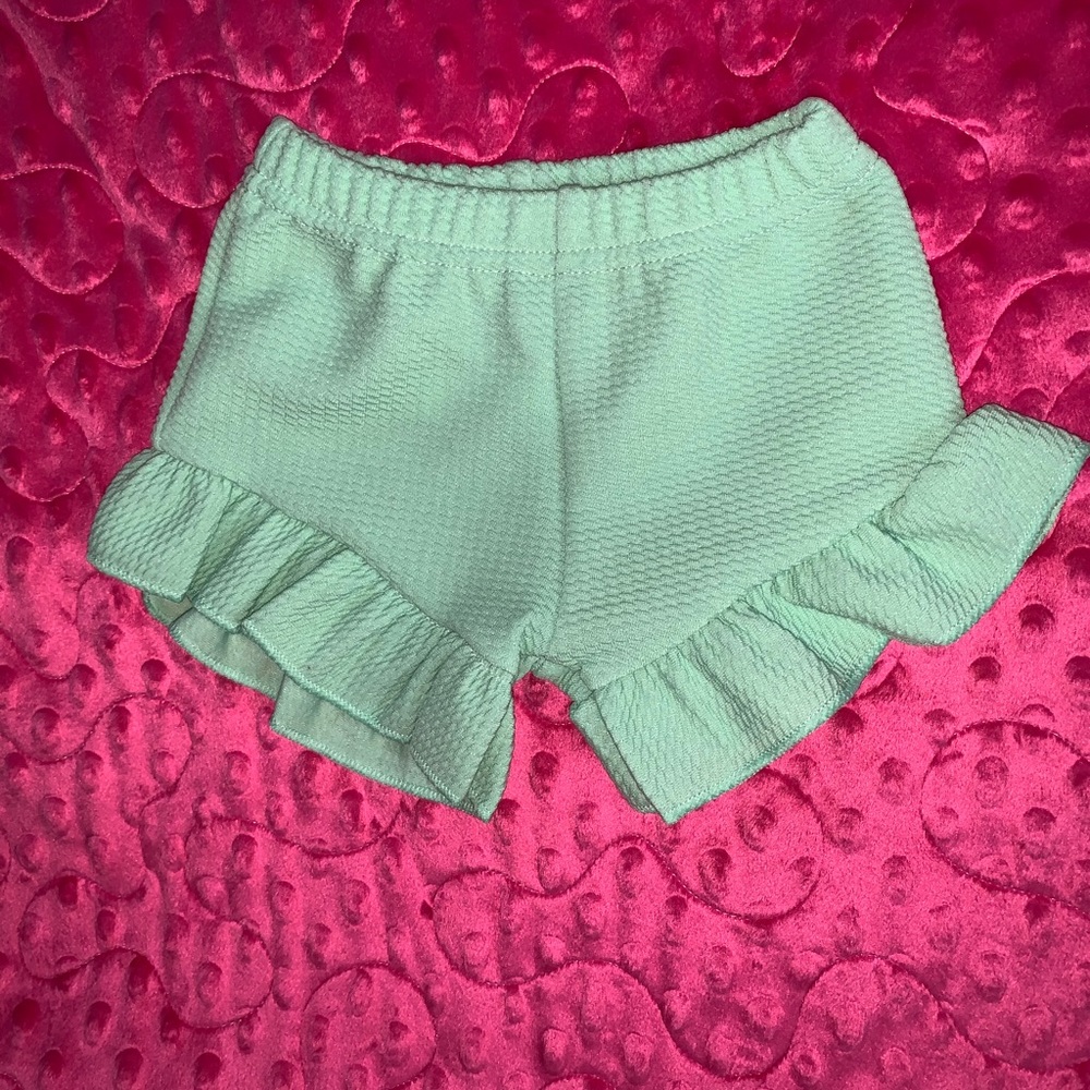 Aqua ruffle shorts